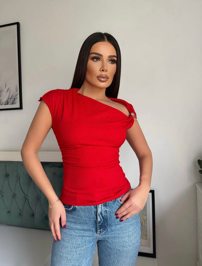 Pull avec Broche Dorée